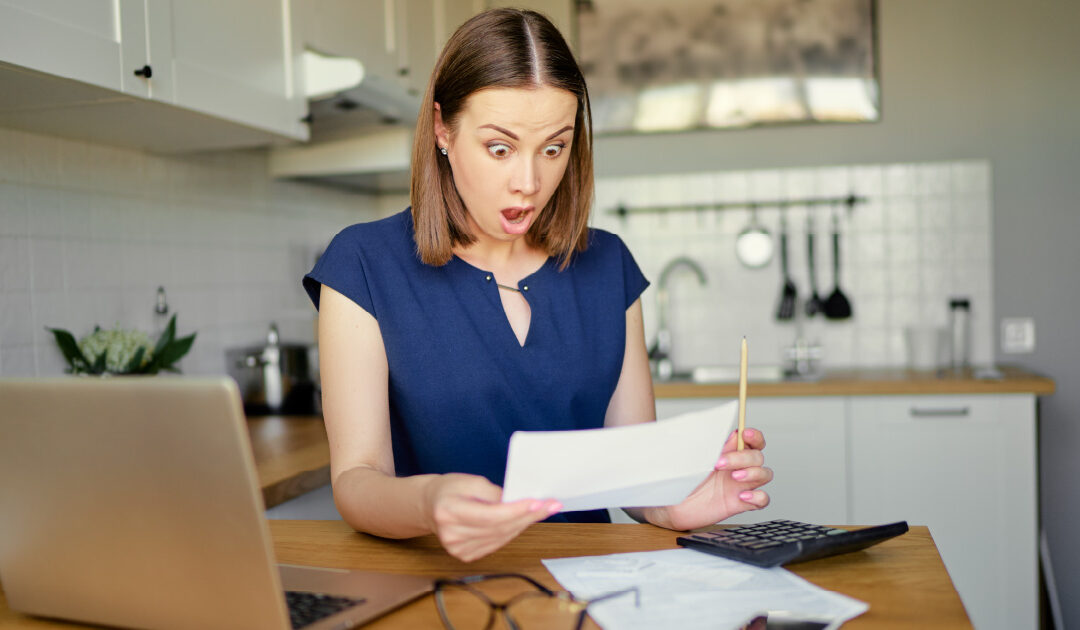 A woman surprised by the bill for a roof replacement