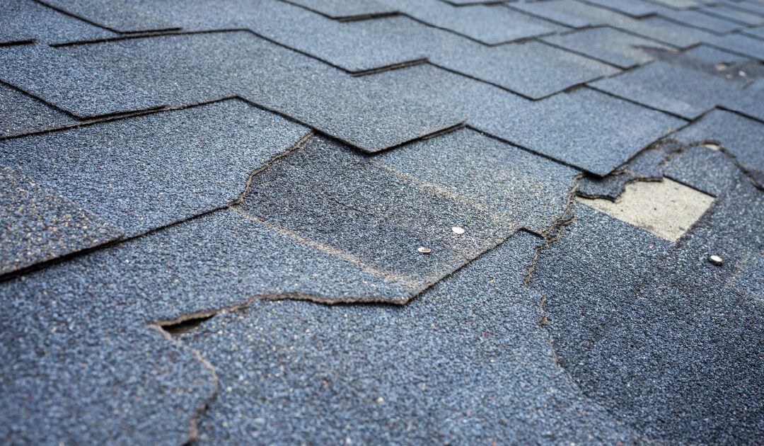 A damaged roof in need of repair or replacement