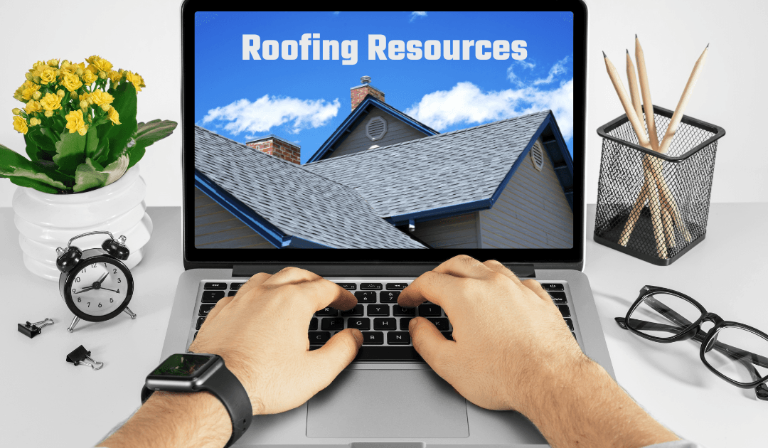 A homeowner reviewing residential roofing resources on a laptop